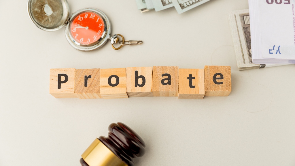 Probate sign, stack of papers and gavel